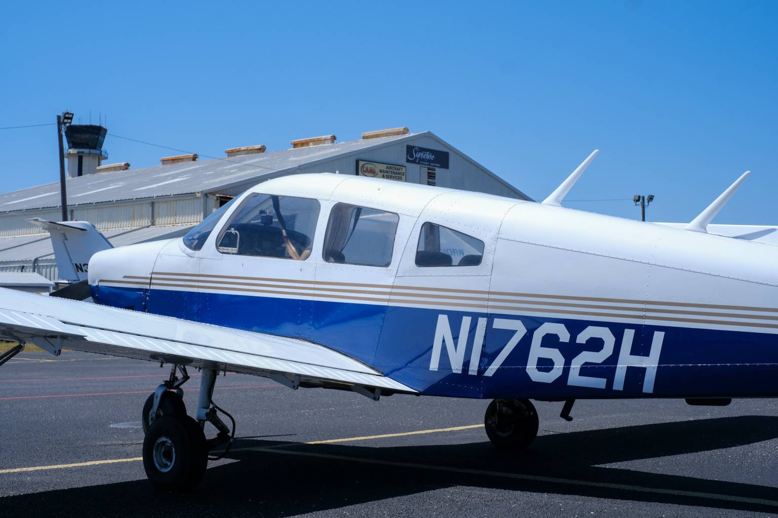 Piper Archer II under Florida sky